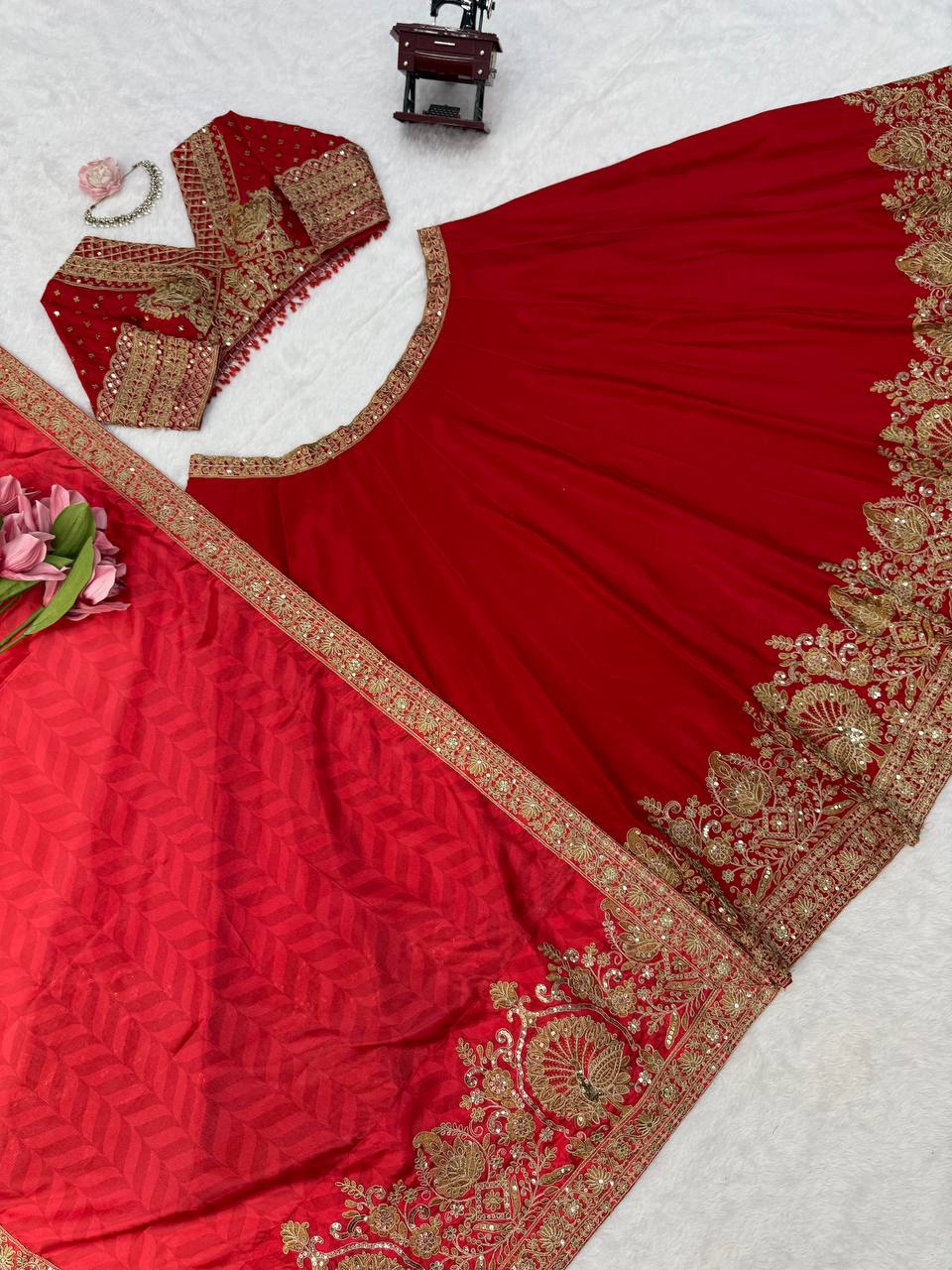 Regal Crimson Red Bridal Lehenga Choli Ensemble Featuring Intricate Gold Zari Embroidery, Heritage Motifs, and Embellished Tassels